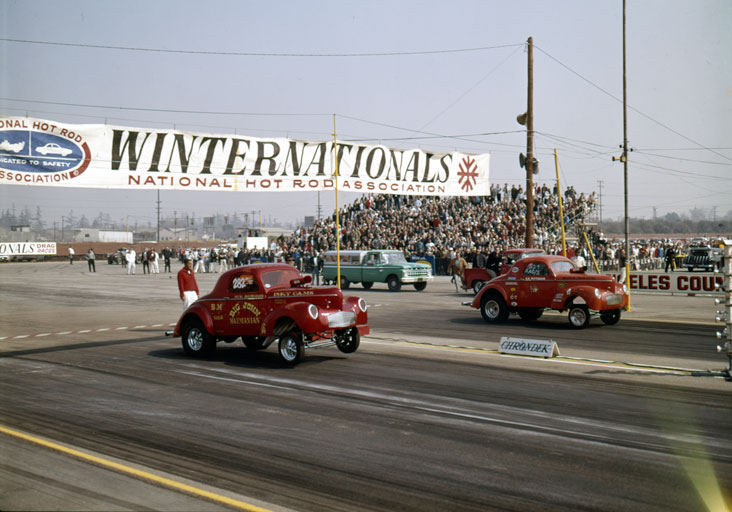 Two cars leave the starting line at the first Winternationals.