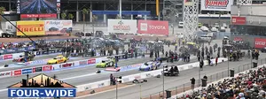 Four Funny Cars lining up to make a run at The Strip at Las Vegas Motor Speedway