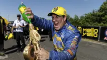 Few drivers enjoy a victory as much as 64-time winner Ron Capps, who’s always happy to share a celebratory Mello Yello with his pal Wally.