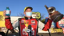 Doug Kalitta pilots his Top Fuel dragster past Steve Torrence in final