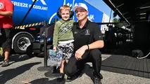 Austin Prock with a drag racing fan