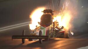 Luigi Novelli drives through an explosion during second qualifying session in St. Louis
