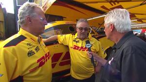 Lee Beard discusses qualifying strategy with DHL Funny Car crew chiefs Jim Oberhofer and Todd Smith