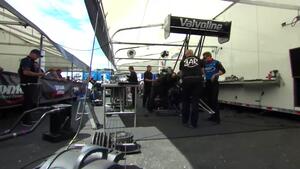 Blake Alexander&#039;s Top Fuel team thrashes in the pits between rounds at Sonoma
