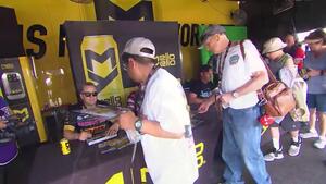 Racers pass out autographs to fans at the Mello Yello Powerhouse in Las Vegas