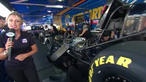Ron Capps' Funny Car team thrashes in the pits between rounds at Sonoma