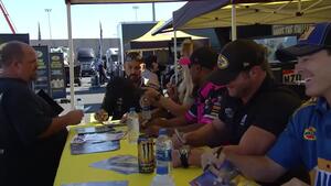Fans line up for autographs at the Mello Yello Power House